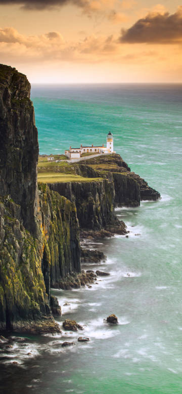 Magnificent Scottish cliff lighthouse seascape wallpaper
