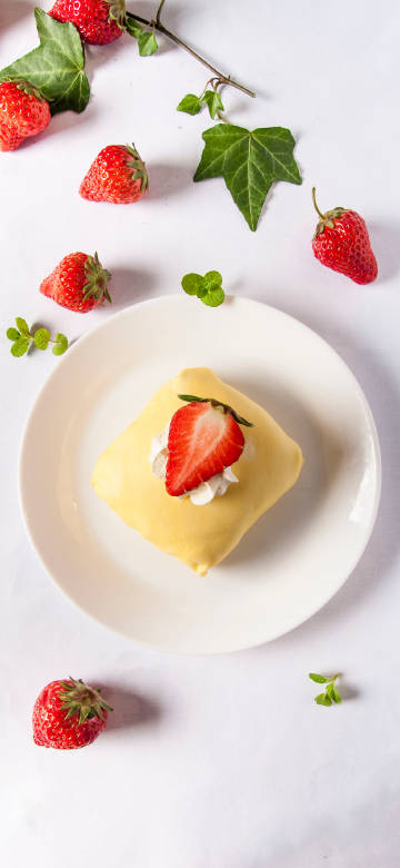 Elegant Strawberry Crepe Dessert Phone Wallpaper 4K