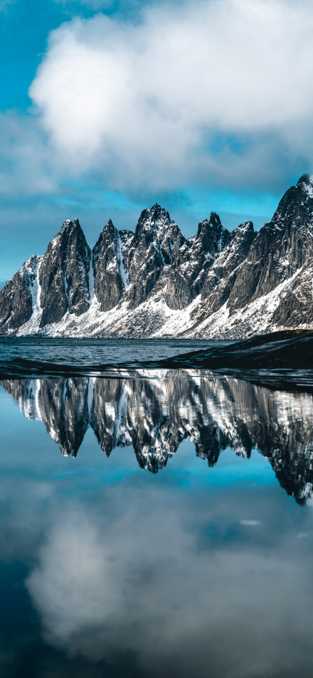Reflection of magnificent snow-capped mountains phone wallpaper