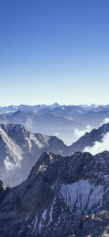 Majestic mountains under the blue sky phone wallpaper