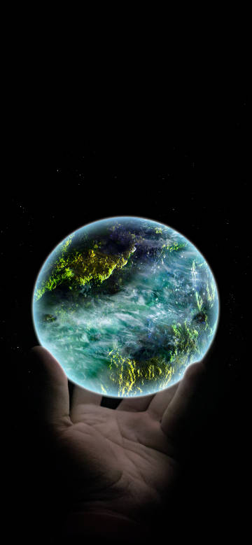 Earth in hand on dark background phone wallpaper