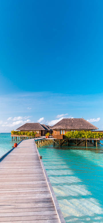 Maldives tropical water bungalow scenery 4K Phone Wallpaper