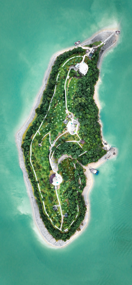 Hidden island surrounded by blue sea phone wallpaper