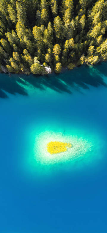 Aerial view of tranquil nature wallpaper: lake, forest and sunlight