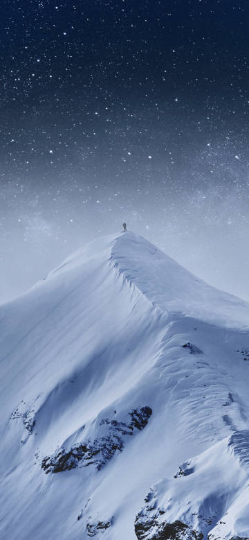 Person on the snowy mountain peak phone wallpaper