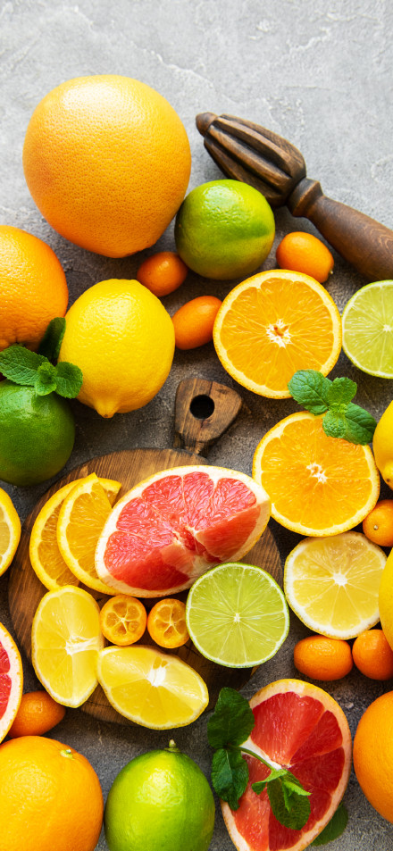 Freshly cut orange and lemon 4K phone wallpaper