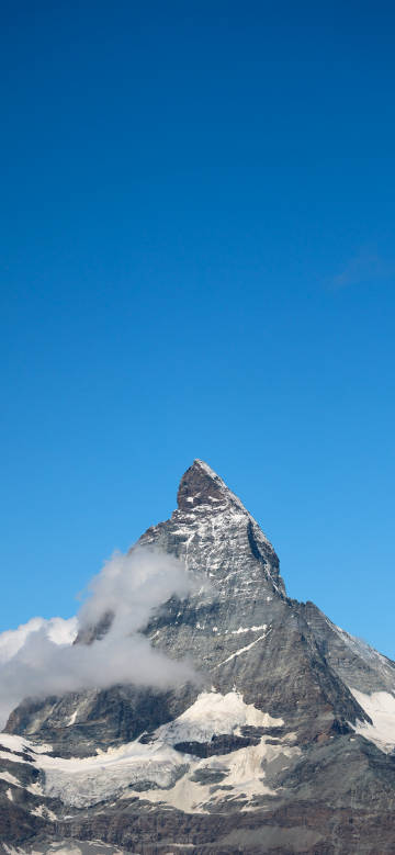 Magnificent snow-capped mountains under the pure blue sky phone wallpaper