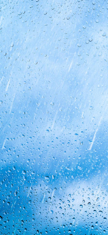 Raindrops on blue glass phone wallpaper
