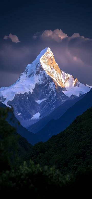 Golden Sunlight on a Majestic Snow Peak 4K Wallpaper