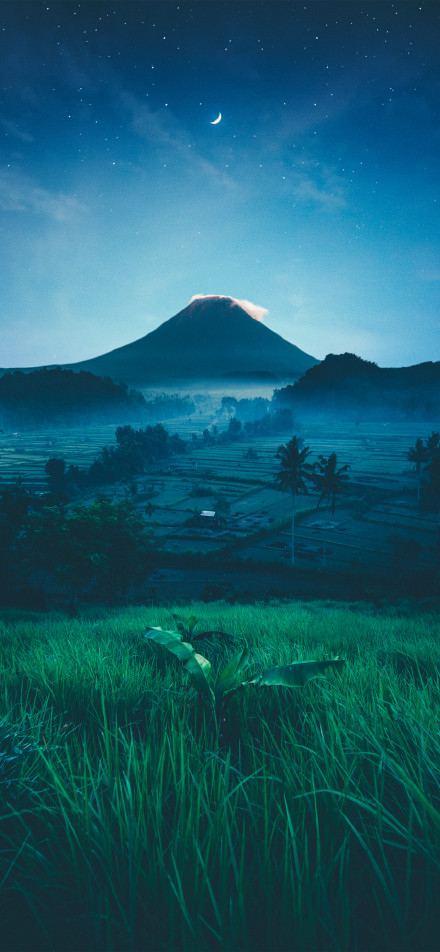 Volcanoes, rice paddies and greenery under the stars