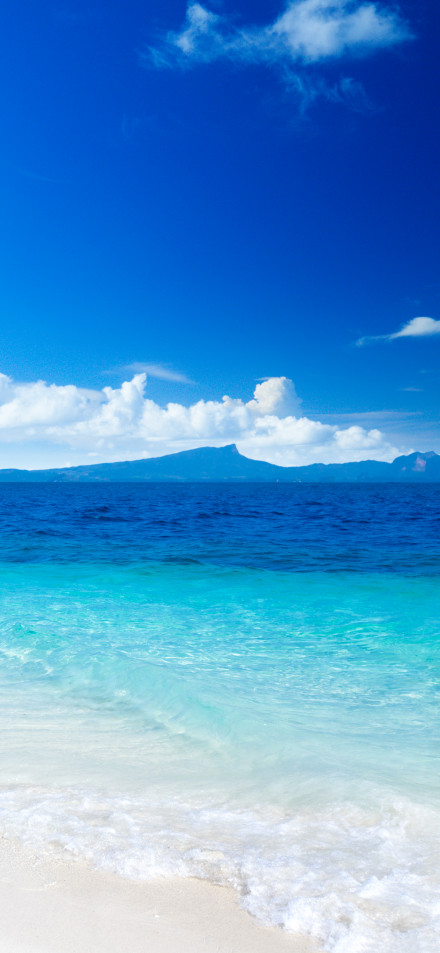 Blue sea view under blue sky phone wallpaper