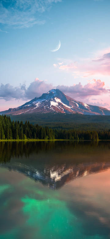 Breathtaking reflections of snow-capped mountains phone wallpaper