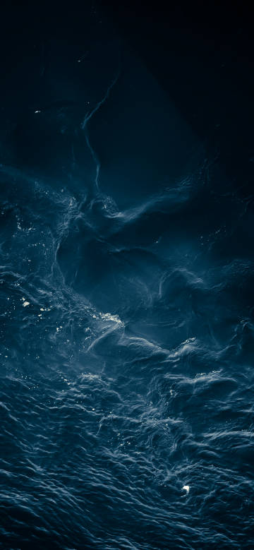 Natural ripples on deep blue sea surface phone wallpaper