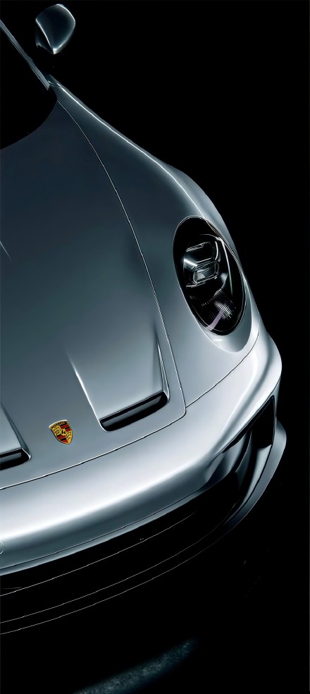 Silver porsche front face in the dark phone wallpaper