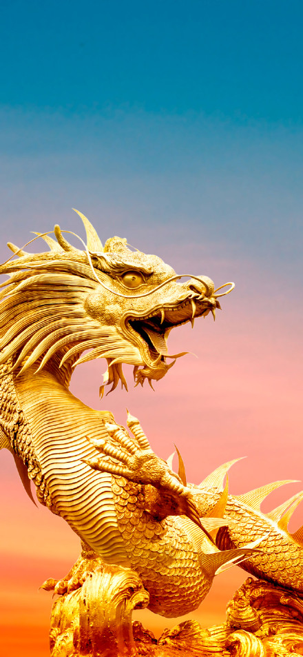 Golden Chinese Dragon Statue Under Sunset Sky 4K Phone Wallpaper