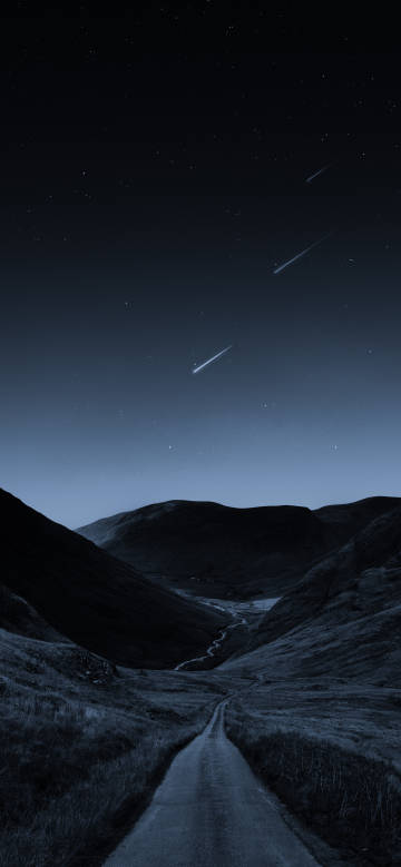 Mountain road under the starry sky at night phone wallpaper