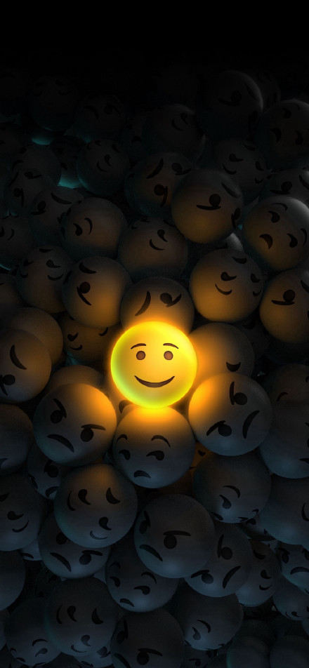 Yellow light smiley ball phone wallpaper