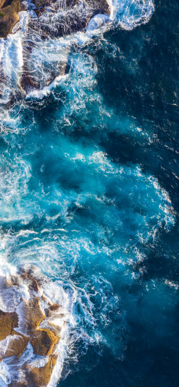 Overlooking Beauty of waves and rocks phone wallpaper