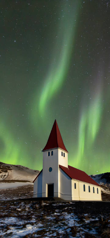 Church in the starry night and northern lights phone wallpaper