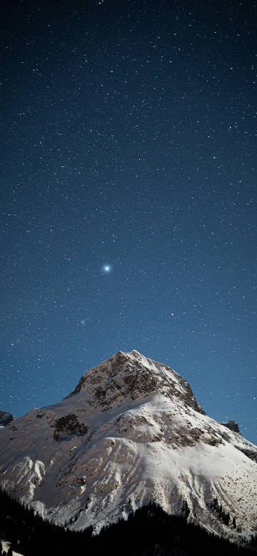 Bright Star Over a Quiet Winter Peak 4K Phone Wallpaper Bright Star Over a Quiet Winter Peak 4K Phone Wallpaper