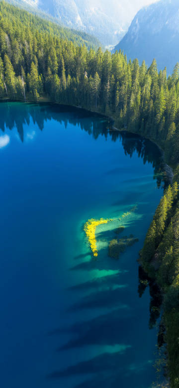 Breathtaking views of serene blue-green lakes and lush forests