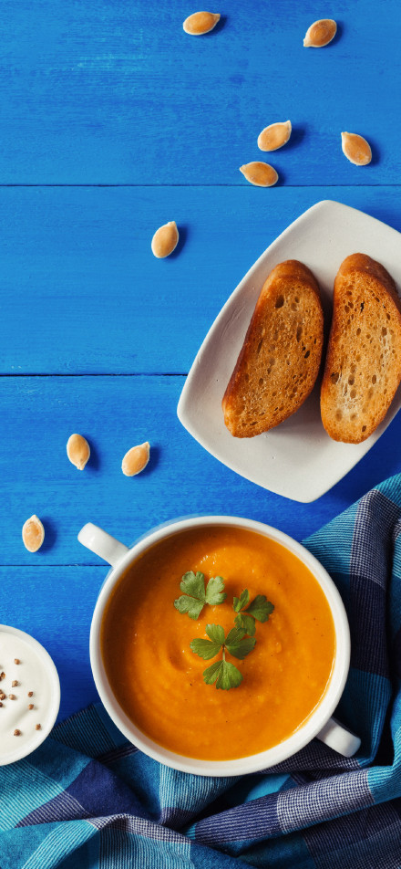 Orange bisque soup with toast phone wallpaper