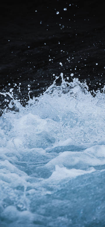 Close-up Shot of Waves Splashing 4K Wallpaper