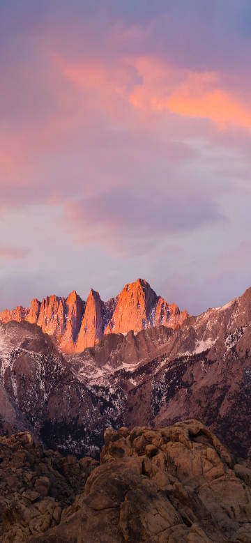 Wonderful scene of mountain peaks in sunset glow phone wallpaper
