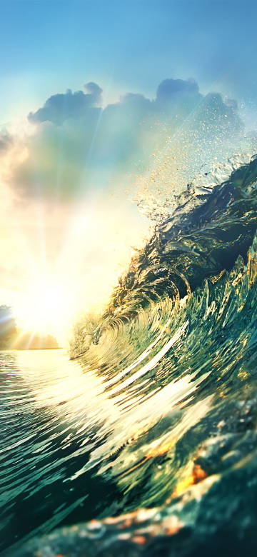 Majestic Ocean Curl at Sunset 4K Wallpaper