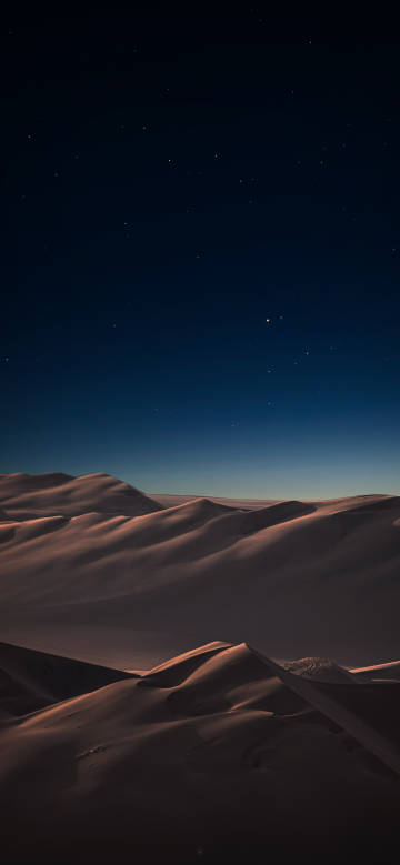 Tranquil desert scenery under the stars phone wallpaper
