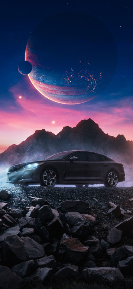 A car under a dreamy starry sky and a huge planet