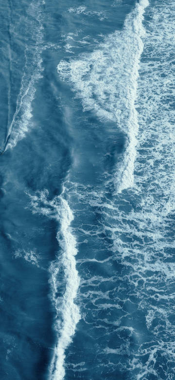 Aerial view of white waves on the sea wallpaper Aerial view of white waves on the sea wallpaper