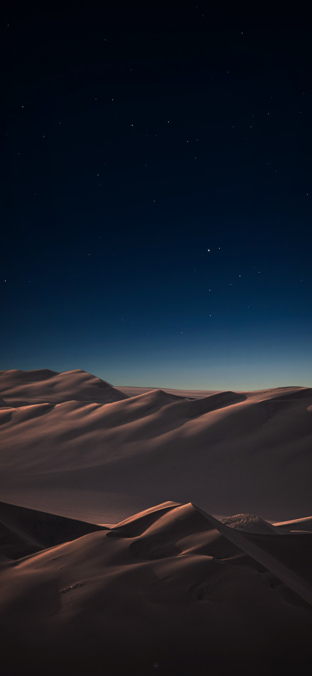 Tranquil desert scenery under the stars phone wallpaper