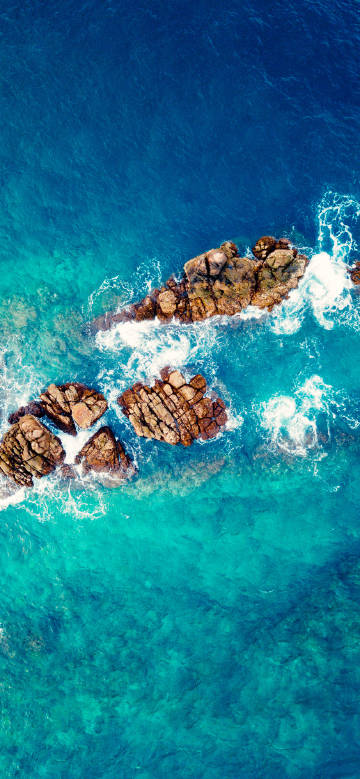 Overlooking ocean reefs phone wallpaper