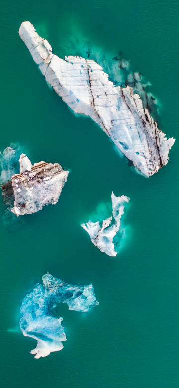 Overlooking the white rocks on the emerald sea phone wallpaper