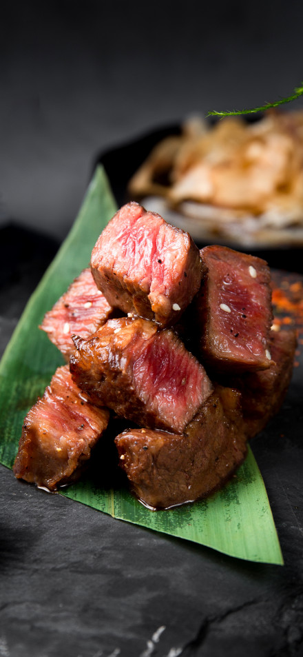 Mouth-watering Medium-Rare Beef Cubes 4K Wallpaper