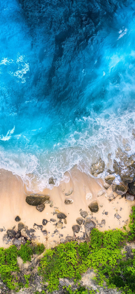 Scenery of blue sea and golden sand phone wallpaper