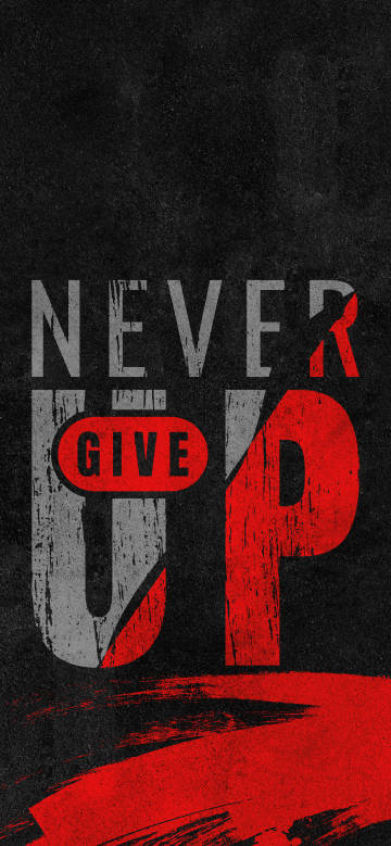 Inspirational words “NEVER GIVE UP” on black background