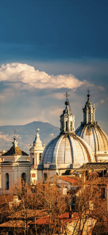 Buildings against blue sky phone wallpaper