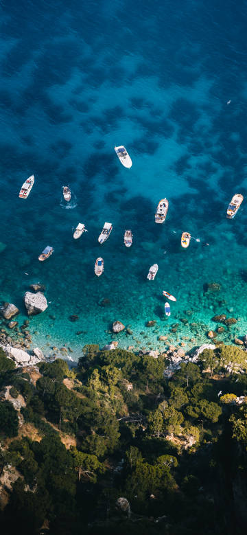 Overlooking the scenery of boats on the clear sea