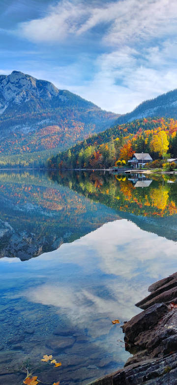 Tranquil and charming autumn mountain lake reflection scenery