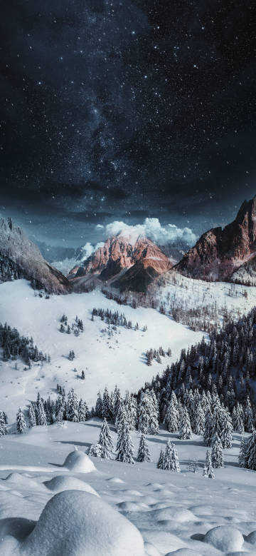 Snow-covered mountains on a starry night phone wallpaper