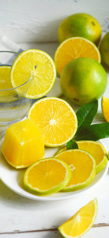 Freshly Sliced Green Oranges 4K Wallpaper