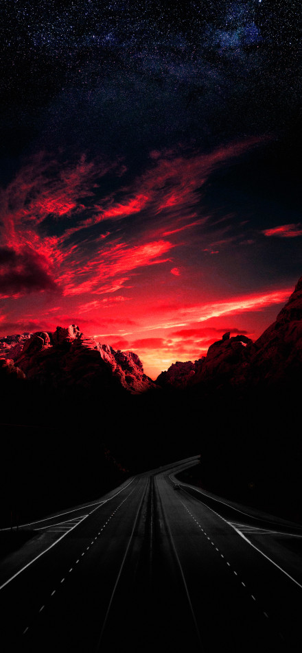 Dark Road Through Red Sunset Mountains 4K Wallpaper