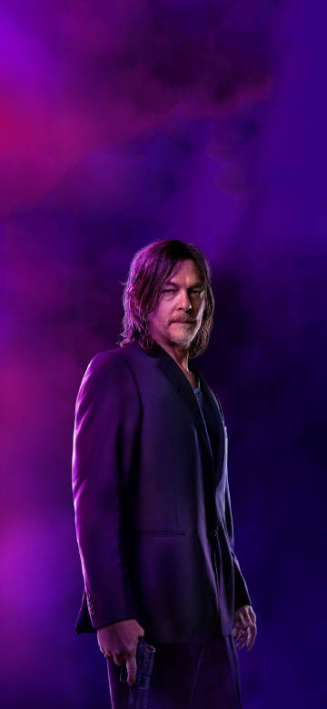 Norman Reedus in a purple-pink background phone wallpaper