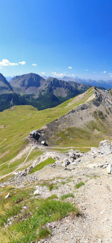 Alpine landscape wallpaper: majestic mountains with clear skies