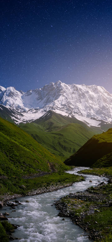 Majestic Mountains and Flowing River in a Starry Night 4K Wallpaper