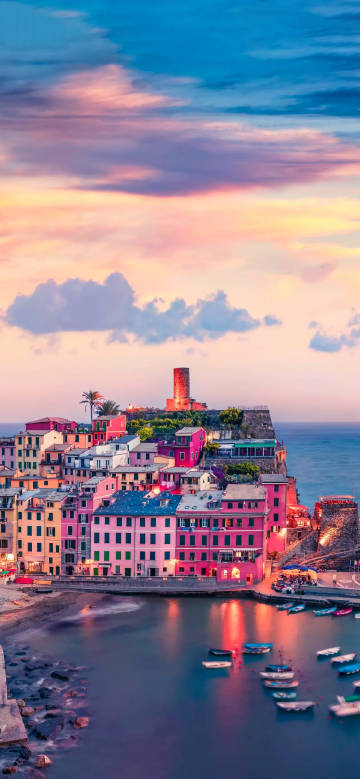 Night view of cinque terre with colorful cliff-side houses phone wallpaper