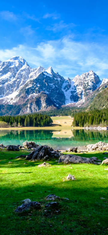 Magnificent snow-capped mountains, lakes, and forests scenery wallpaper