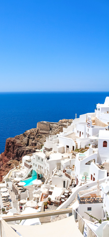 Santorini with blue sea and sky phone wallpaper